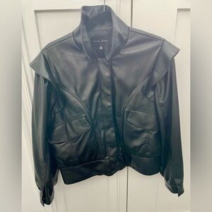 Nearly new, black PU leather jacket. Nicely priced and great design.